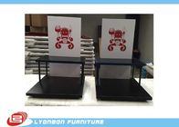 Black Knives display stand with 2 shelves and 4 metal support tubes and foam board